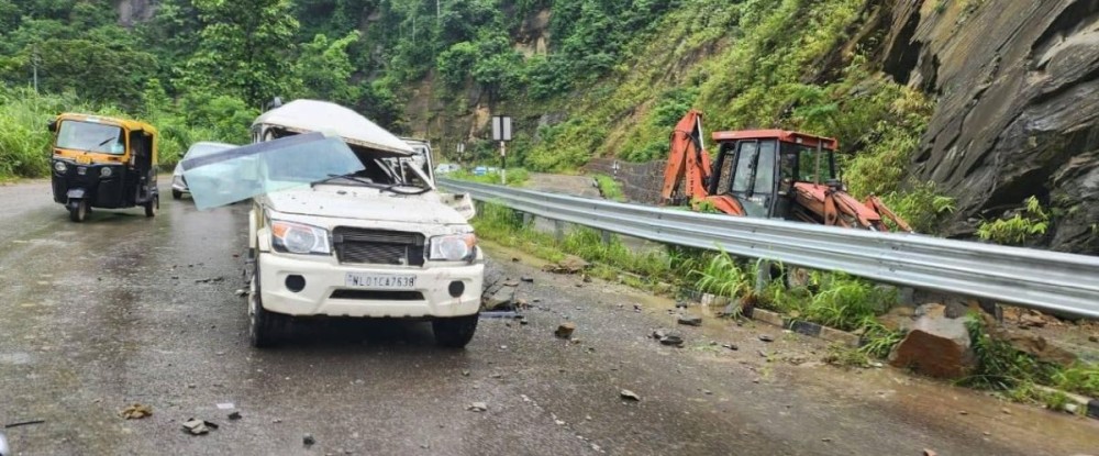 The vehicle which was damaged by falling rocks at the Paglapahar stretch of National Highway-29 on July 5.
